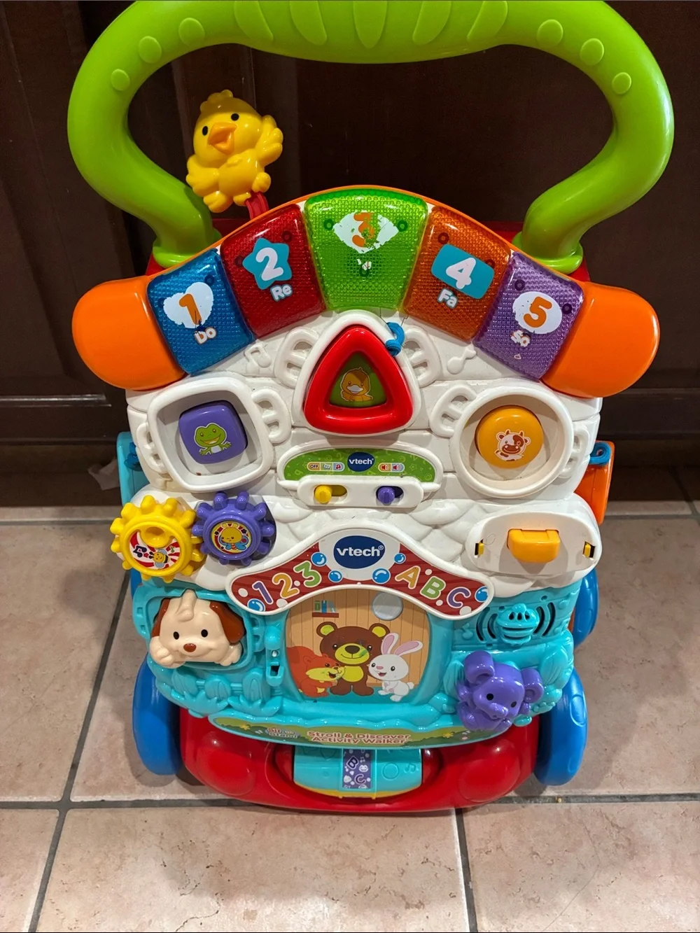 VTech Multi-Activity Learning Walker – Green Handle with Blue & Red Base